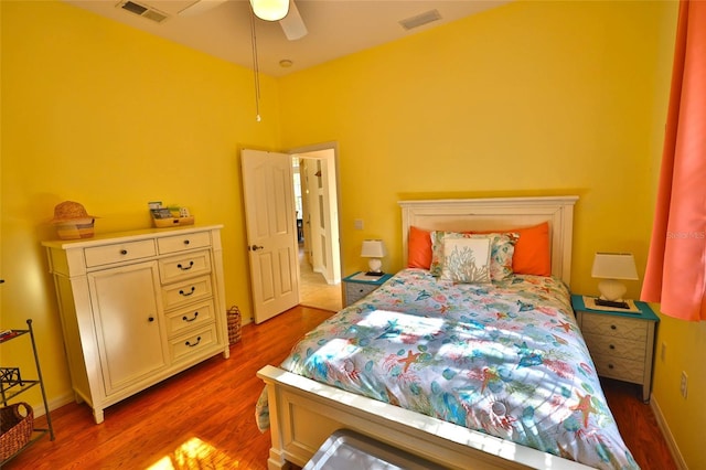950 Trotter St, Nokomis, FL 34275 - bedroom featuring wood finished floors and a ceiling fan