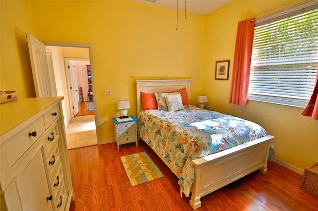 950 Trotter St, Nokomis, FL 34275 - bedroom featuring light wood-style floors and baseboards