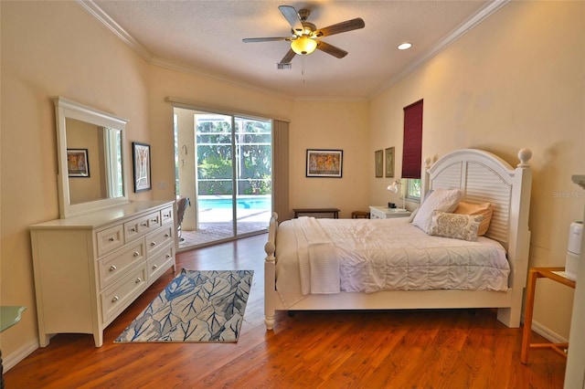 950 Trotter St, Nokomis, FL 34275 - bedroom featuring access to exterior, ornamental molding, dark wood-style floors, ceiling fan, and recessed lighting