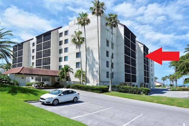 2045 Gulf Of Mexico Dr Unit M1-514, Longboat Key, FL 34228 - view of apartment building / complex featuring uncovered parking