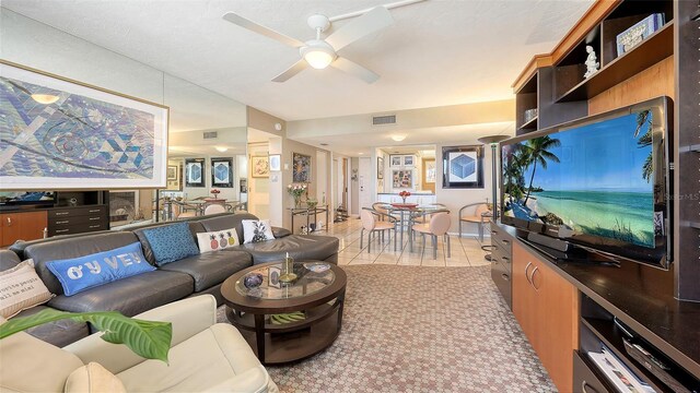 2045 Gulf Of Mexico Dr Unit M1-514, Longboat Key, FL 34228 - living room featuring ceiling fan and light tile patterned flooring