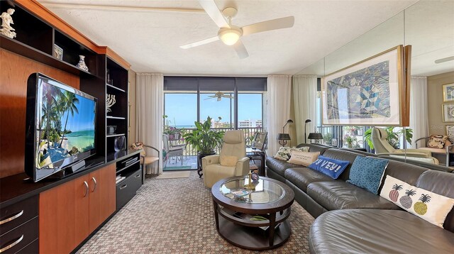 2045 Gulf Of Mexico Dr Unit M1-514, Longboat Key, FL 34228 - living room with a ceiling fan, healthy amount of natural light, and carpet flooring