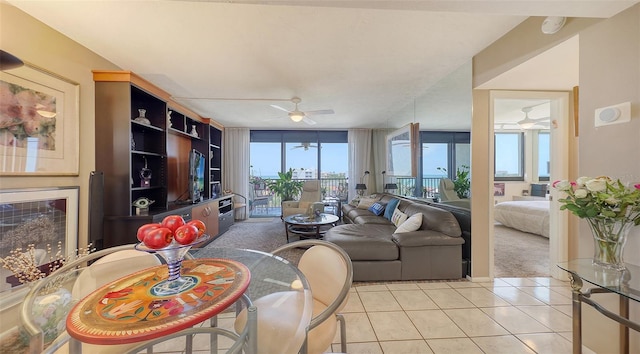 2045 Gulf Of Mexico Dr Unit M1-514, Longboat Key, FL 34228 - living area with ceiling fan, light tile patterned floors, and light carpet