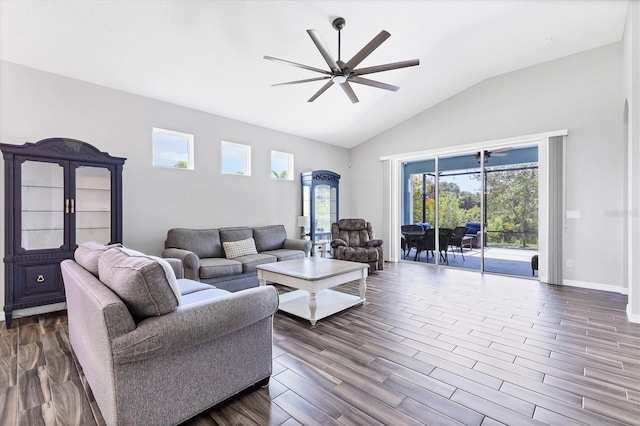 12755 Rainwashed Loop, Parrish, FL 34219 - living room with ceiling fan, lofted ceiling, dark wood-style floors, and baseboards