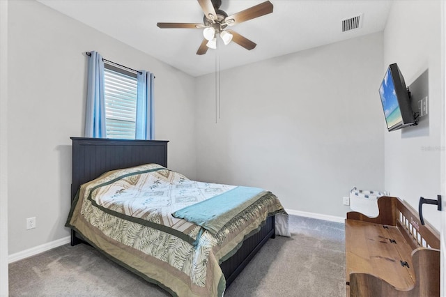 12755 Rainwashed Loop, Parrish, FL 34219 - bedroom with carpet floors, baseboards, and ceiling fan
