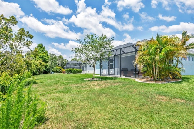 12755 Rainwashed Loop, Parrish, FL 34219 - view of green lawn with glass enclosure