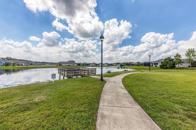 12755 Rainwashed Loop, Parrish, FL 34219 - dock area featuring a water view, a yard, and a residential view