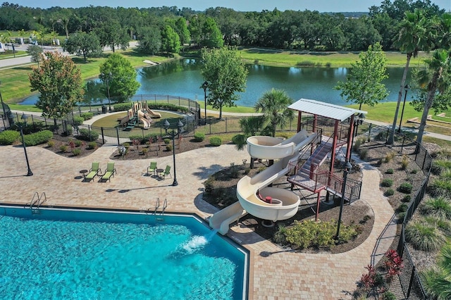 12755 Rainwashed Loop, Parrish, FL 34219 - view of swimming pool with a water slide and a water view