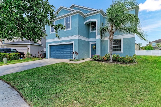 1721 Palm Warbler Ln, Ruskin, FL 33570 - traditional home with stucco siding, driveway, and a garage