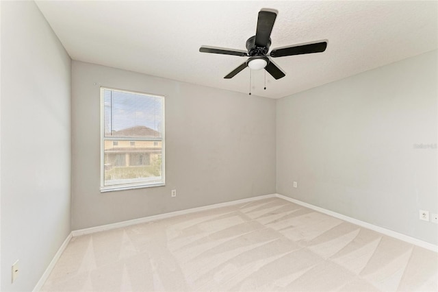 1721 Palm Warbler Ln, Ruskin, FL 33570 - empty room featuring light colored carpet, baseboards, and ceiling fan