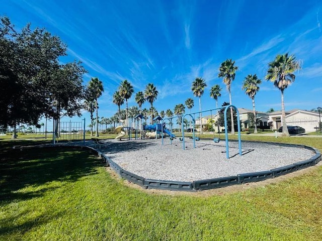 1721 Palm Warbler Ln, Ruskin, FL 33570 - community play area with a lawn