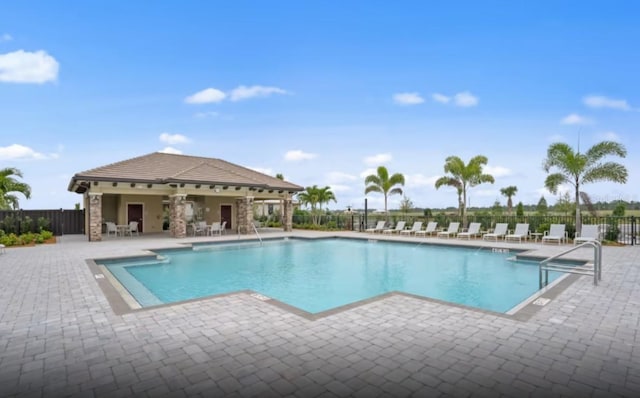 7327 Summerland Cv, Bradenton, FL 34202 - community pool featuring a patio area