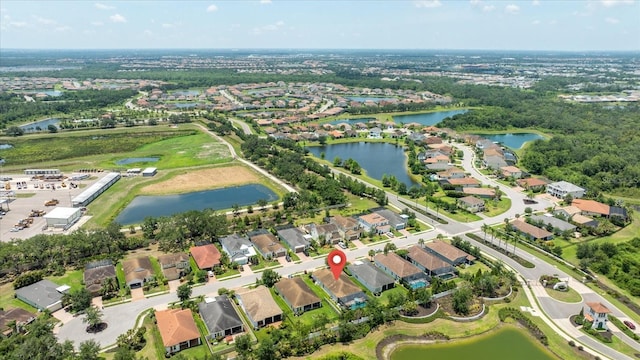13819 American Prairie Pl, Bradenton, FL 34211 - aerial view of property and surrounding area featuring nearby suburban area and a nearby body of water