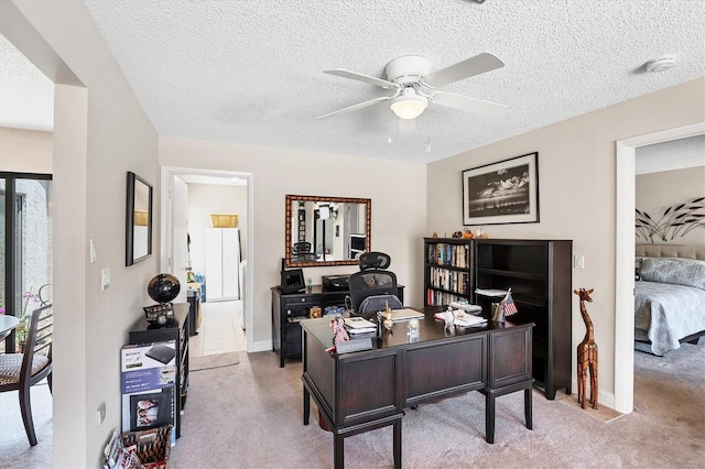 3914 Glen Oaks Manor Dr, Sarasota, FL 34232 - carpeted office featuring a ceiling fan, a textured ceiling, and baseboards