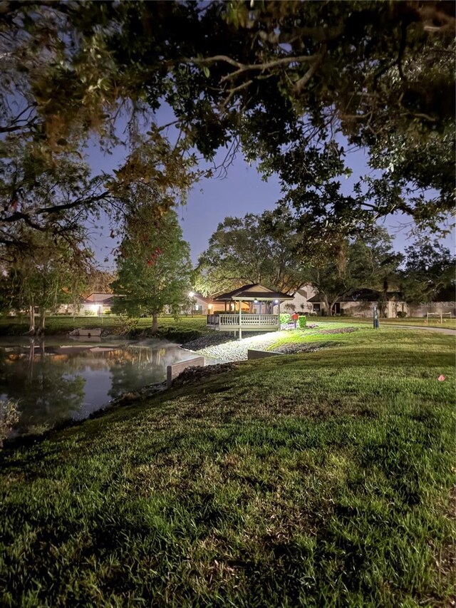 3914 Glen Oaks Manor Dr, Sarasota, FL 34232 - view of grassy yard featuring a water view