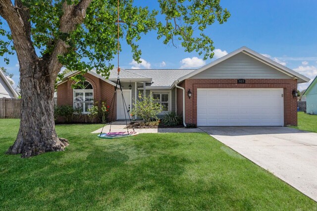 613 E 49th St E, Bradenton, FL 34208 - ranch-style home with brick siding, an attached garage, and concrete driveway