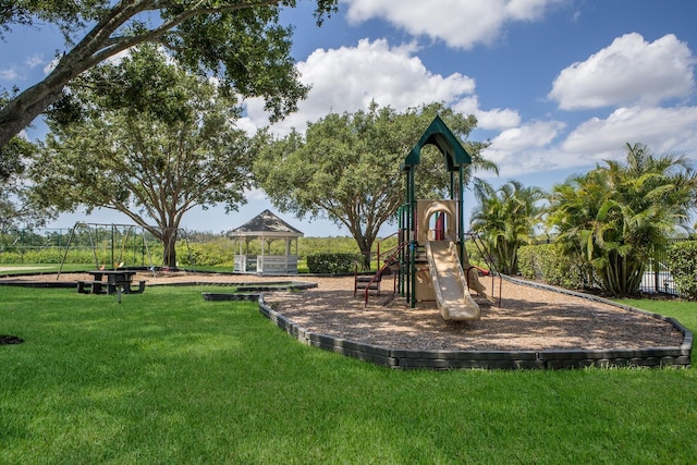 613 E 49th St E, Bradenton, FL 34208 - community play area with a gazebo and a yard