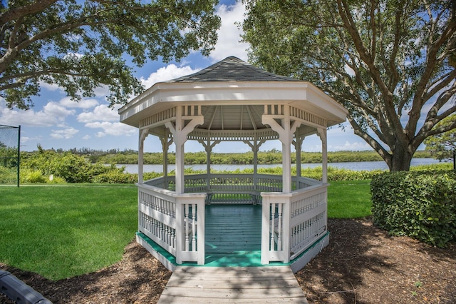 613 E 49th St E, Bradenton, FL 34208 - surrounding community with a gazebo, a yard, and a water view