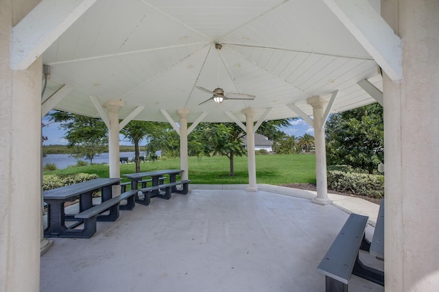 613 E 49th St E, Bradenton, FL 34208 - view of patio with a water view and ceiling fan