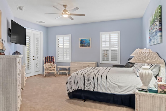 6808 Belmont Ct, Lakewood Ranch, FL 34202 - bedroom with light colored carpet, access to exterior, and a ceiling fan