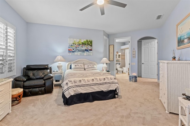 6808 Belmont Ct, Lakewood Ranch, FL 34202 - carpeted bedroom with arched walkways and ceiling fan