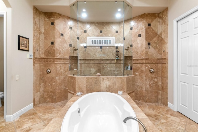 6808 Belmont Ct, Lakewood Ranch, FL 34202 - full bath with a bath, walk in shower, baseboards, and toilet