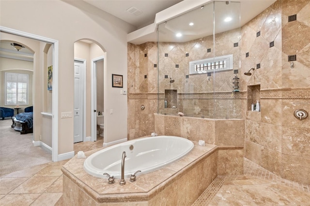6808 Belmont Ct, Lakewood Ranch, FL 34202 - bathroom with a garden tub, a tile shower, toilet, ensuite bath, and baseboards