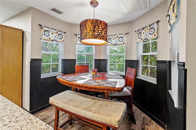 2306 63rd St W Unit 40, Bradenton, FL 34209 - dining room with wood finished floors and wainscoting