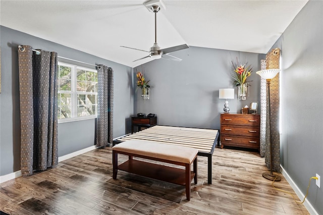 2306 63rd St W Unit 40, Bradenton, FL 34209 - bedroom featuring vaulted ceiling, wood finished floors, baseboards, and ceiling fan