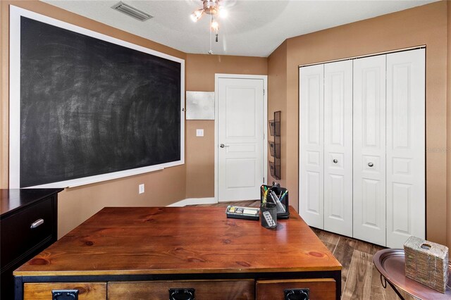 2306 63rd St W Unit 40, Bradenton, FL 34209 - office area featuring wood finished floors and ceiling fan