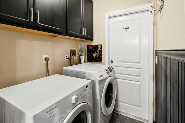 2306 63rd St W Unit 40, Bradenton, FL 34209 - washroom with cabinet space, washer and dryer, and tile patterned flooring