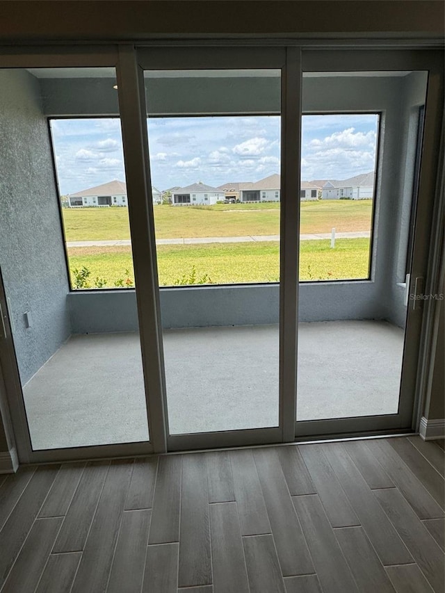 24831 Buckingham Way, Port Charlotte, FL 33980 - entryway with plenty of natural light and dark wood-style floors