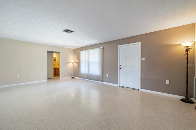 135 Gulfview Rd, Punta Gorda, FL 33950 - unfurnished room featuring speckled floor and baseboards