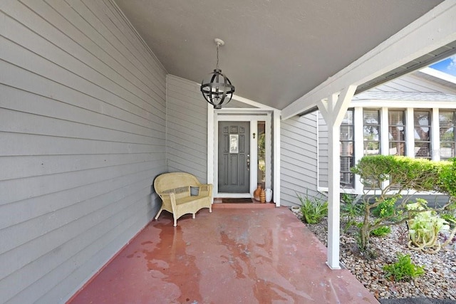 7321 Caladesia Dr, Sarasota, FL 34243 - entrance to property with a porch