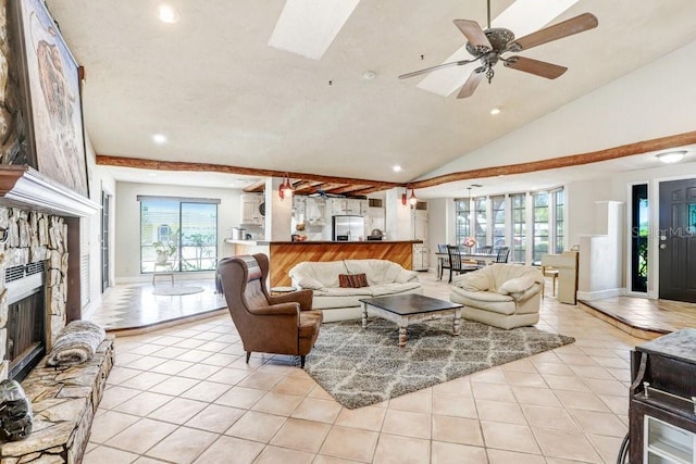 7321 Caladesia Dr, Sarasota, FL 34243 - living room with light tile patterned floors, recessed lighting, a fireplace, a ceiling fan, and baseboards