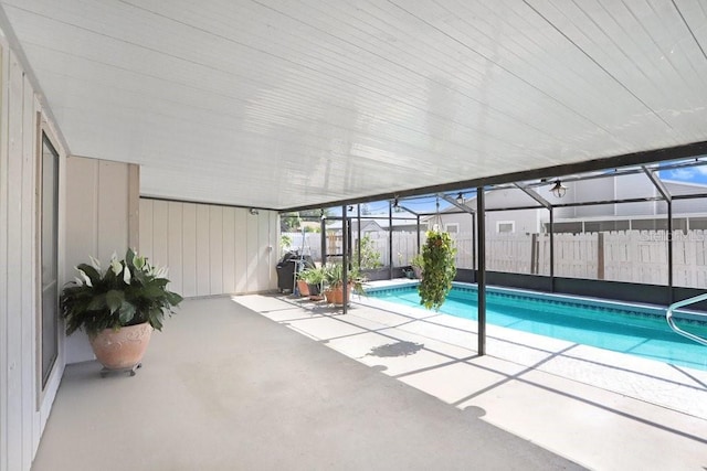 7321 Caladesia Dr, Sarasota, FL 34243 - view of pool with a patio, a fenced backyard, and a lanai
