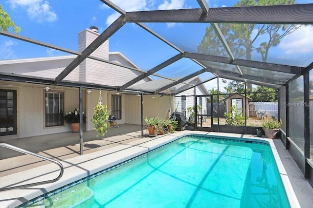 7321 Caladesia Dr, Sarasota, FL 34243 - swimming pool featuring a patio and a lanai