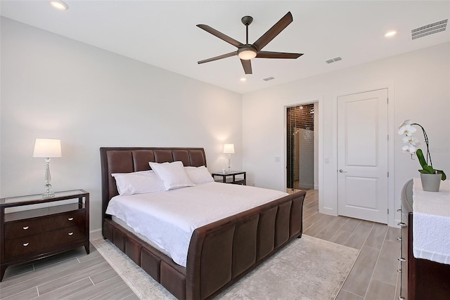 11427 Viani Ter, Palmetto, FL 34221 - bedroom featuring wood tiled floors, recessed lighting, a ceiling fan, and baseboards