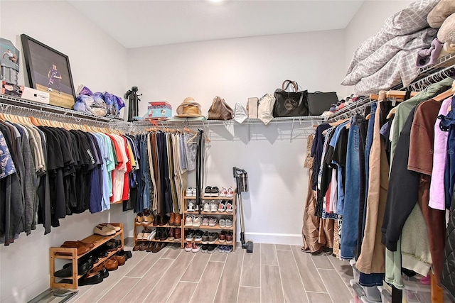 11427 Viani Ter, Palmetto, FL 34221 - spacious closet featuring wood tiled floors