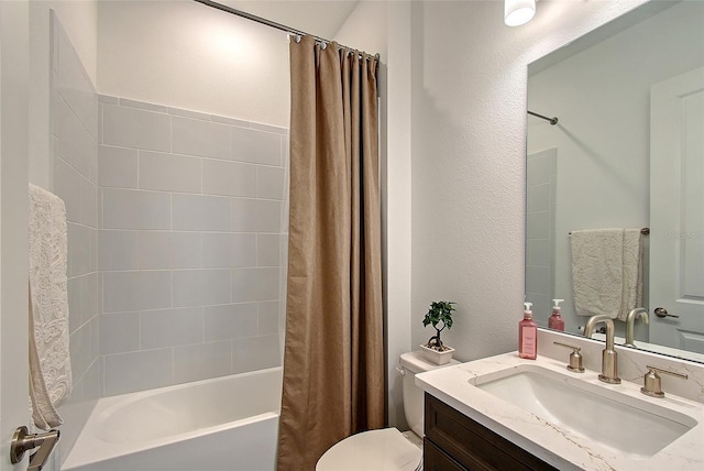 11427 Viani Ter, Palmetto, FL 34221 - full bathroom featuring toilet, vanity, shower / bath combo with shower curtain, and a textured wall