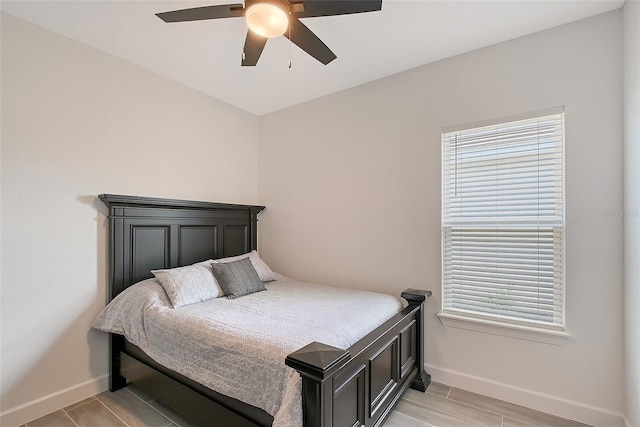 11427 Viani Ter, Palmetto, FL 34221 - bedroom featuring baseboards and ceiling fan