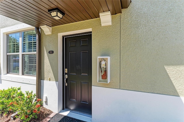 121 Porta Vecchio Bnd Unit 201, Nokomis, FL 34275 - doorway to property with stucco siding