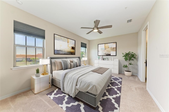 121 Porta Vecchio Bnd Unit 201, Nokomis, FL 34275 - bedroom with light carpet, baseboards, and a ceiling fan