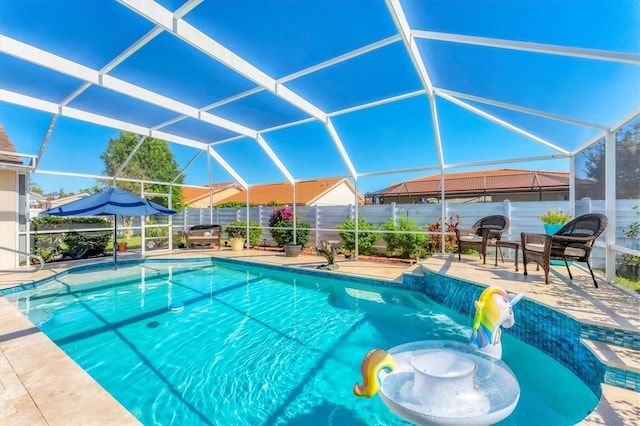 4585 Dover Street Cir E, Bradenton, FL 34203 - view of pool with a fenced backyard, a patio area, and glass enclosure