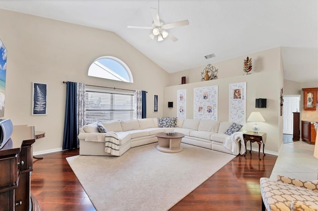 4585 Dover Street Cir E, Bradenton, FL 34203 - living room featuring a ceiling fan, high vaulted ceiling, dark wood finished floors, and baseboards