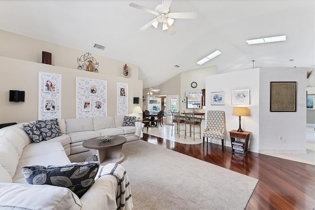 4585 Dover Street Cir E, Bradenton, FL 34203 - living area with ceiling fan, lofted ceiling, wood finished floors, and a skylight