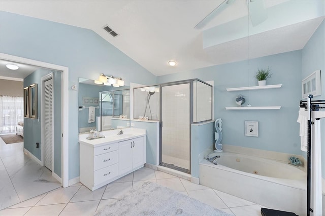 4585 Dover Street Cir E, Bradenton, FL 34203 - bathroom with vanity, a whirlpool tub, a shower stall, lofted ceiling, and baseboards