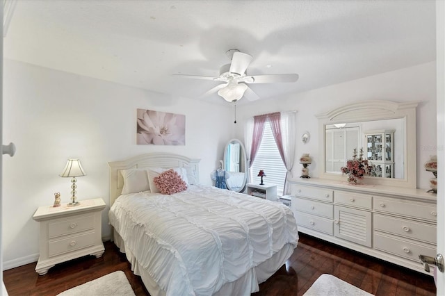 4585 Dover Street Cir E, Bradenton, FL 34203 - bedroom with dark wood-type flooring and ceiling fan