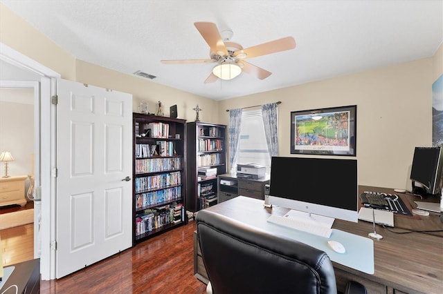 4585 Dover Street Cir E, Bradenton, FL 34203 - home office featuring dark wood-type flooring and ceiling fan