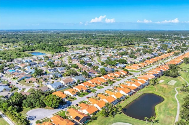 4585 Dover Street Cir E, Bradenton, FL 34203 - aerial overview of property's location featuring a nearby body of water, a golf club, and nearby suburban area